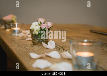 Flowers on a Wedding Register Reception Table Stock Photo