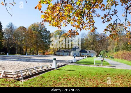 Park with riding arena, Schloss Berleburg Castle, Bad Berleburg, Wittgensteiner Land district, North Rhine-Westphalia, Germany, Europe Stock Photo