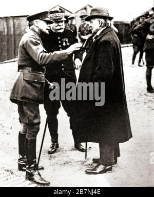 A top level meeting at the British HQ at Méaulte in the Somme department, Hauts-de-France in northern France. From left Field Marshal Douglas Haig, British commander; Marshal Joseph Joffre, French general and Commander-in-Chief of French forces on the Western Front; David Lloyd George, Prime Minister of the United Kingdom during World war One. Stock Photo