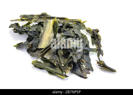 Dried wakame seaweed isolated on white background Stock Photo