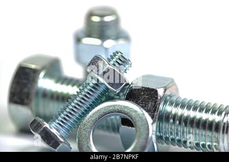 Metal screws against a white background Stock Photo