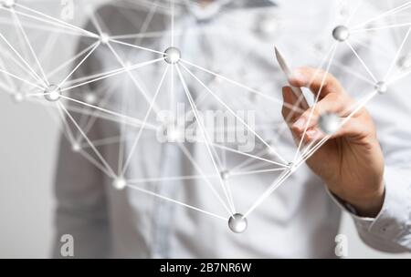 Male hand and small globes connected -global connectivity data and digital network Stock Photo