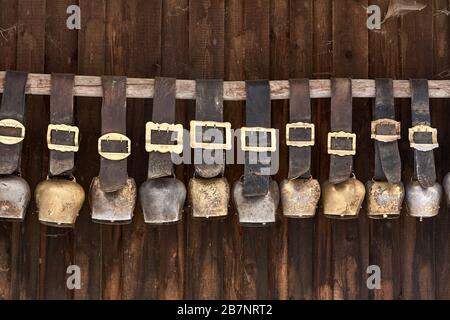 A collection of old cowbells at the stable of the guesthouse Besler's Schwand close to Obersdorf/Allgaeu. Stock Photo