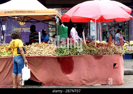 Port Of Spain, Trinidad and Tobago. 12th Dec, 2019. Fruit and vegetable vendors ply their trade along Charlotte Street in the capital city of the Caribbean island of Trinidad and Tobago. Credit: G. Ronald Lopez/ZUMA Wire/Alamy Live News Stock Photo