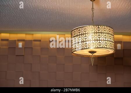 Modern 3-Light Led yellow Chandelier. Pendant Sconce Lighting Lamp . Ceiling Light Oval Pendant Light Fixture. Hanging Lights with Creme Fabric Shade. Stock Photo