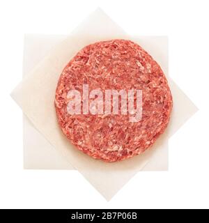 Raw fresh large beef burger isolated on white background. Stock Photo