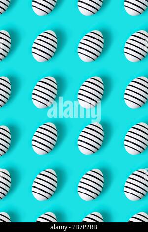 Pattern made of hand drawn eggs on blue pastel background. Easter concept. Stock Photo