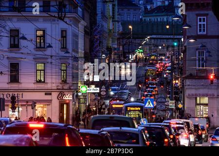Wien, Vienna: streetcar, cars, car light trails, heavy traffic, rush hour, street Währinger Straße, in 09. Alsergrund, Wien, Austria