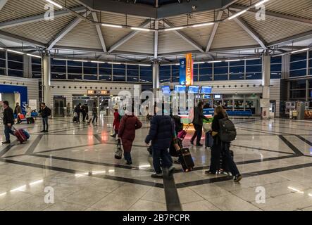 Athens Old Town, Attica/ Greece - 12 28 2019: Travellers walking through the transportation hub of the Athens Airport metro hall Stock Photo