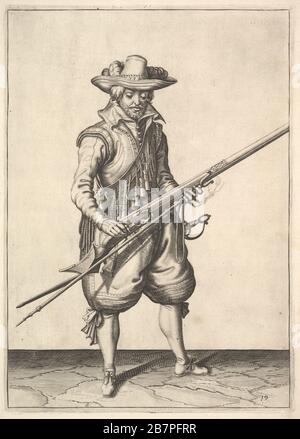 A soldier shaking the powder from the top of the pan, from the Musketeers series, plate 19, in Wapenhandelinghe van Roers Musquetten Ende Spiessen (The Exercise of Arms). Stock Photo