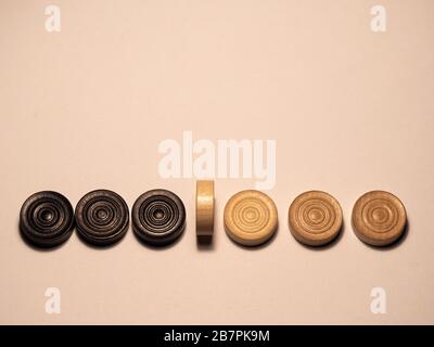 Social distancing concept showing how it can stop spreading of corona virus pandemic. Game stone concept illustrating epidemic safety. Stock Photo
