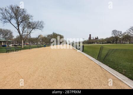 The Washington, DC National Mall devoid of usual throngs of March tourists because of coronavirus precautions including the closing of all Smithsonian Museums which line The Mall. March 16, 2020. Stock Photo