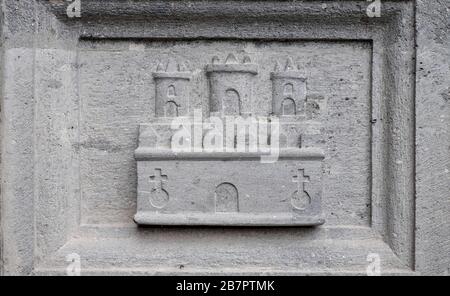 Sandstone relief decoration on an old building: a castle. Stock Photo