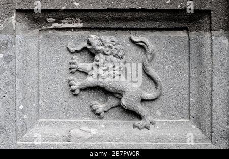 Sandstone relief decoration on an old building, : griffin / gryphon. Stock Photo