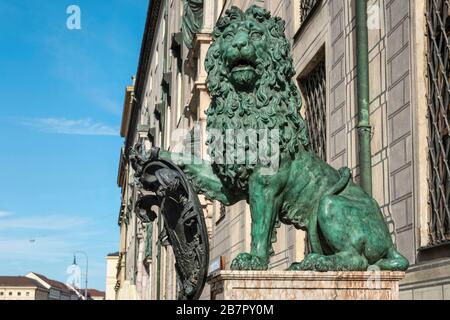 Bavaria-Munich-Germany, Oktober 13. 2019: Bavarian lion statue in front of the Alte Residenz at Odeonplatz in Munich Stock Photo