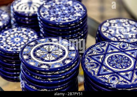 Ornate ceramic coasters at Ceramica Santa Ana in the Triana neighbourhood, Seville, Andalusia, Spain Stock Photo