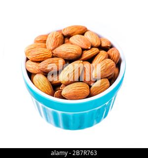 A cup of almonds isolated on white Stock Photo