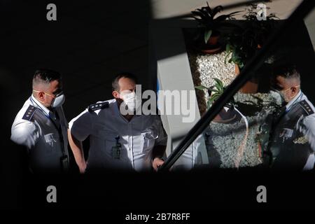 Bucharest, Romania. 17th Mar, 2020. Aviation personnel wearing face masks are seen at Henri Coanda International Airport in Bucharest, Romania, March 17, 2020. Romanian President Klaus Iohannis announced that the country will enter an emergency state starting March 16, in an effort to ensure that the government uses all resources to fight the COVID-19 epidemic. Credit: Cristian Cristel/Xinhua/Alamy Live News Stock Photo