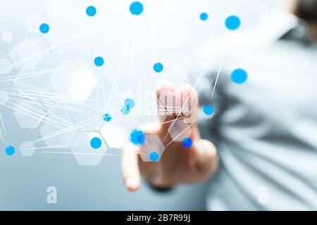 Closeup shot of a businessman presenting the virtual projection of modern data Stock Photo