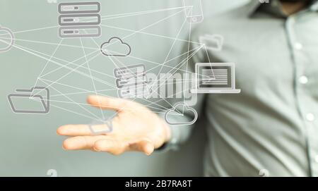 Person presenting the virtual projection of a digital cloud Stock Photo