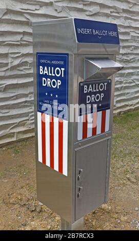 Official Absentee Ballot Drop box outside the Lake County Board of Elections in Painesville, Ohio, USA, allowing people to vote before the March 17, 2020 Presidential Primary Vote in Ohio. The Ohio primary was suspended by the Governor, due to the corona pandemic, with intentions to move it to June 2, 2020.  He is considering various options with one reportedly being a mail only election. Stock Photo