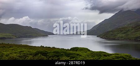 Panoramic view of the Killary Harbour under a cloudy sky at daytime in Ireland Stock Photo