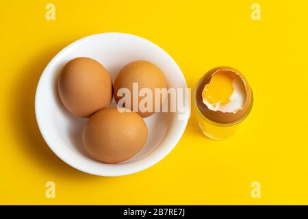 Half cooked egg inside the shell Stock Photo