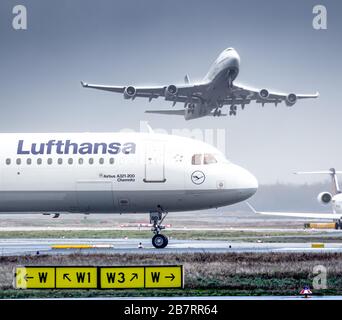 Frankfurt, Germany - February 25, 2020: Lufthansa Airbus A321 and Boeing 747 airplane at Frankfurt Int'l airport (FRA) in Germany. Airbus is an aircra Stock Photo