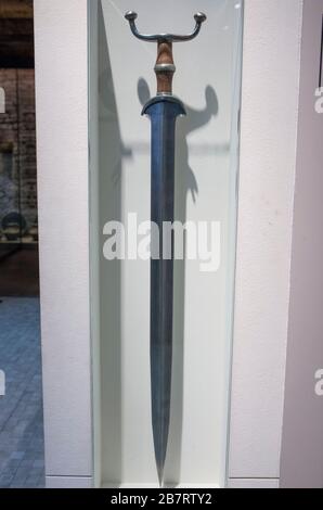Barcelona, Spain - Dec 27th, 2019: Iron antennas sword, 6th century BC. Catalan Museum of Archaeology, Barcelona, Spain Stock Photo