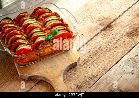 Ratatouille - Traditional Dish Of Provencal Cuisine. Healthy Vegetable Food. Wooden Background. Stock Photo