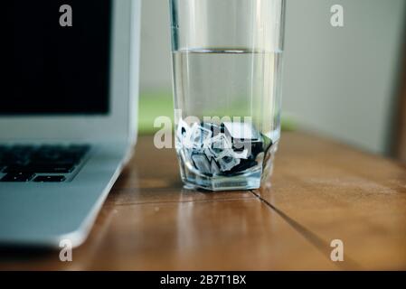 cleaning laptop keys in water. Laptop repair Stock Photo
