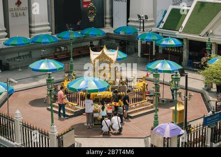 Erawan Shrine in Bangkok, Thailand. It is normally crowded with tourists, mainly from China but only has a few people due to the coronavirus outbreak. Stock Photo