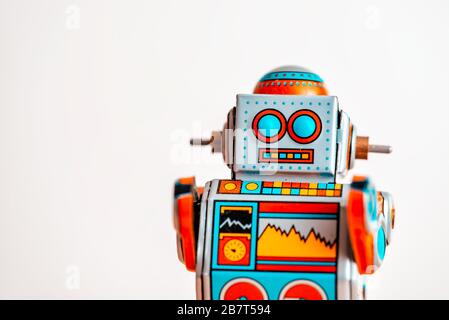 Toy wind-up robot isolated on white Stock Photo