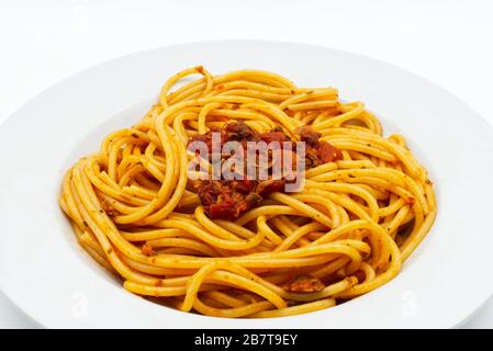 Italian seafood spaghetti with clams. Spaghetti alle Vongole isolated on white. Close-up Stock Photo
