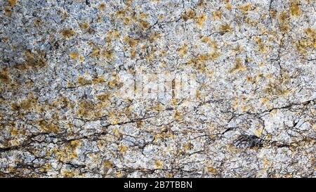 surface of the marble with brown tint. Details of sand stone texture, close up shot of rock surface with vignette at cover and bright spot at centre Stock Photo