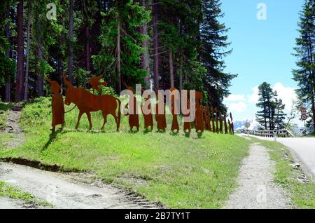 Kaunergrat, Tyrol - June 22, 2016: Iron sculptures represent a sacrificial procession from former century Stock Photo