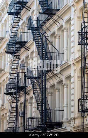 architectural detail view of traditional cast iron buildings in the Soho Cast Iron Historic District in downtown Manhattan, New York City Stock Photo