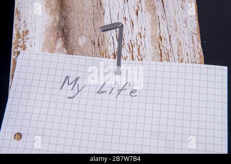 Empty sheet nailed on the wood as a diary Stock Photo