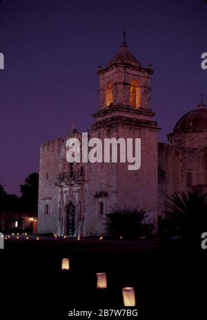 San Antonio, Texas USA:  Sanctuary of Mission San Jose, part of the San Antonio Missions National Historical Park, lit by luminarias at Christmas time. . ©Bob Daemmrich Stock Photo