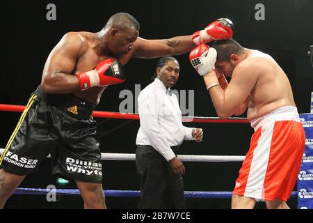 Dillian Whyte (black shorts) defeats Taya Mehmed (red shorts) in a Heavyweight boxing contest at Medway Park, Gillingham, promoted by Frank Maloney Stock Photo