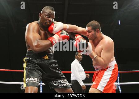 Dillian Whyte (black shorts) defeats Taya Mehmed (red shorts) in a Heavyweight boxing contest at Medway Park, Gillingham, promoted by Frank Maloney Stock Photo