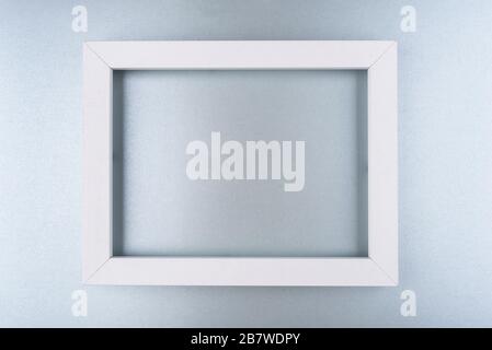 White text frame on a silver background. Stock Photo
