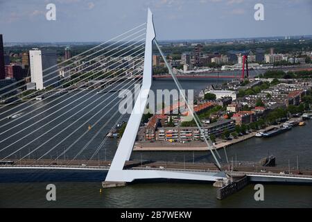 Overview of Rotterdam with in forefront the Erasmusbrug, Noordereiland, Willemsbrug, Maas river and even the Kralingse plassen on an extremely clear d
