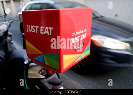 Bordeaux , Aquitaine / France -  01 04 2019 : Just Eat sign logo food restaurant home delivery company carrier scooter motorcycle Stock Photo