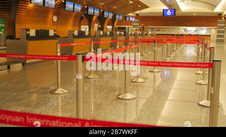 Almost empty main hall of Taiwan Taoyuan International Airport Stock Photo