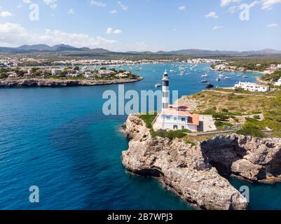 Aerial view, lighthouse, Punta de ses Crestes, Bay of Portocolom and Cala Parbacana, Portocolom, Majorca, Balearic Islands, Spain Stock Photo