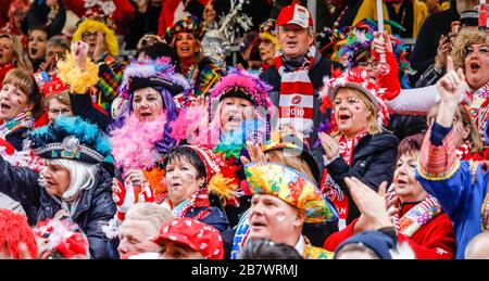 Colourfully costumed carnivalists celebrate carnival in Cologne, on Weiberfastnacht the street carnival is traditionally opened at the Alter Markt Stock Photo