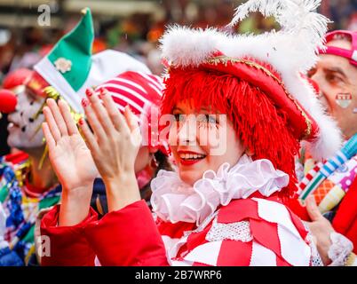 Colourfully costumed carnivalists celebrate carnival in Cologne, on Weiberfastnacht the street carnival is traditionally opened at the Alter Markt Stock Photo