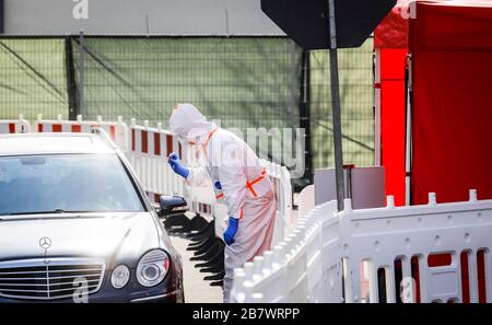 Drive-In, vehicle check for coronavirus test, doctor takes a smear through car windows during the COVID-19 pandemic, Oberhausen, Ruhr area, North Stock Photo