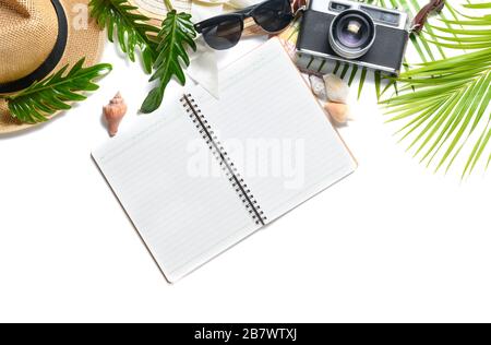 Blank notebook with vintage camera and hot isolated on white background, prepare accessories for travel summer trip concept Stock Photo